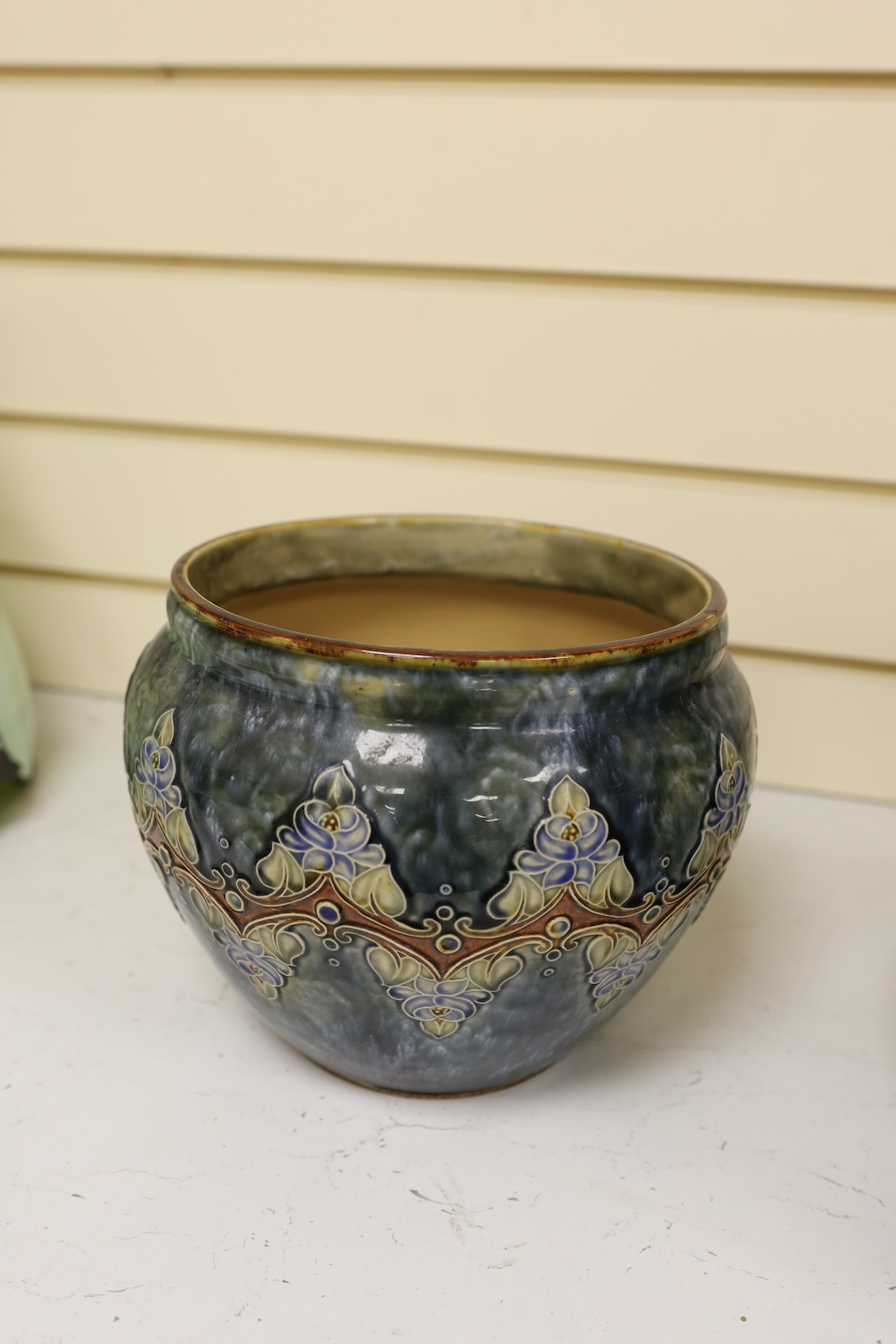 Two Royal Doulton early 20th century stoneware jardinieres and a similar stoneware bowl, tallest jardiniere 22cm high. Condition - frilled edge jardiniere chipped